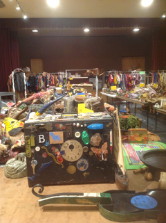 The auditorium is filled to overflowing, as volunteers prep for the Anuual Folk Art Flea (photos by Caroline Dechert)