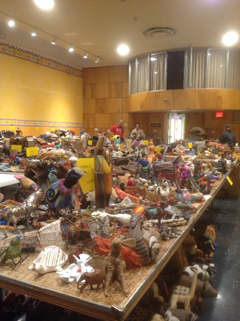 The auditorium is full to bursting with dnated items to be sold at the Flea