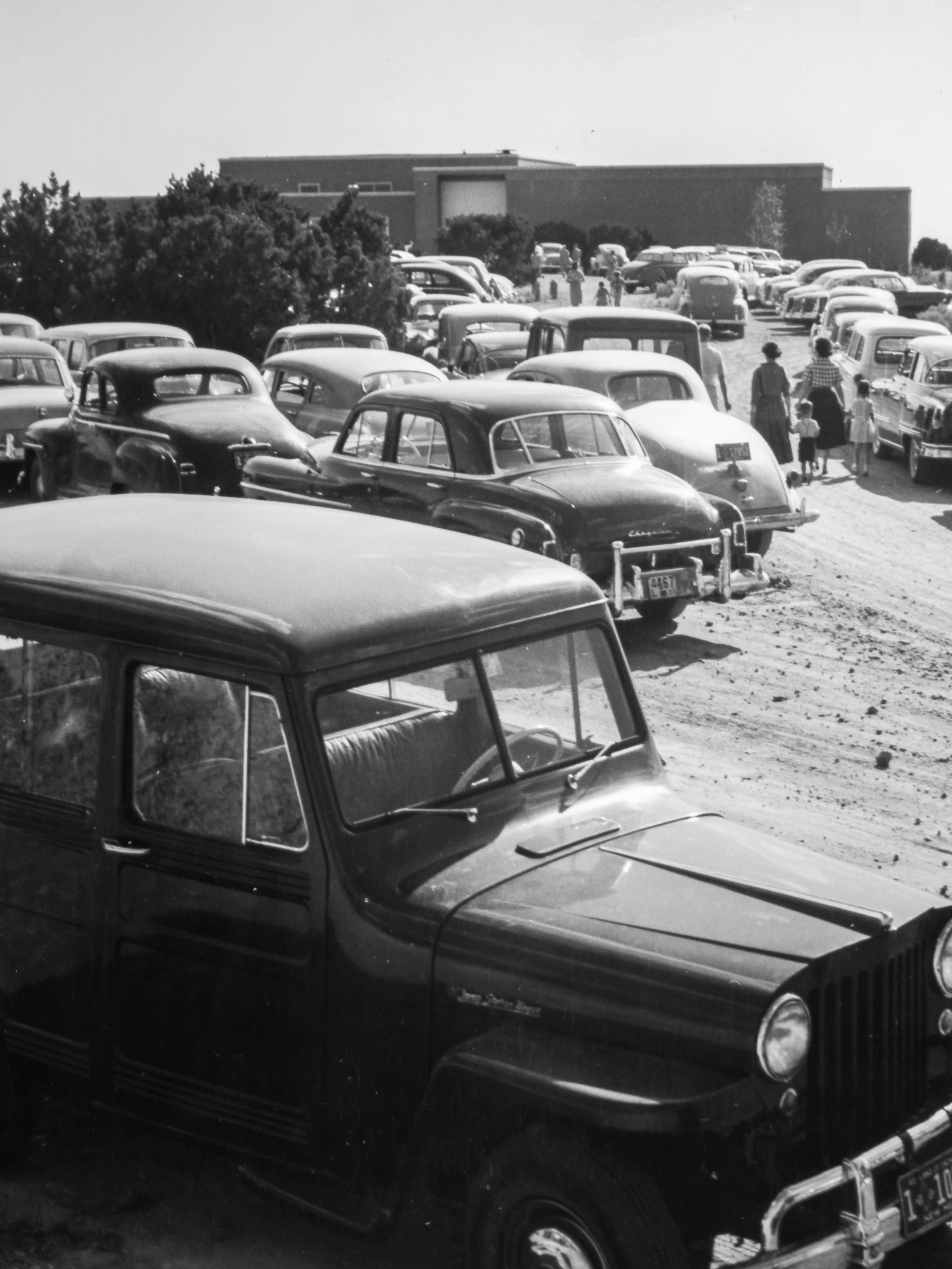The dirt parking lot on Opening Day in 1953, original photographer unknown, cropped version of a digital image by Blair Clark, 2016